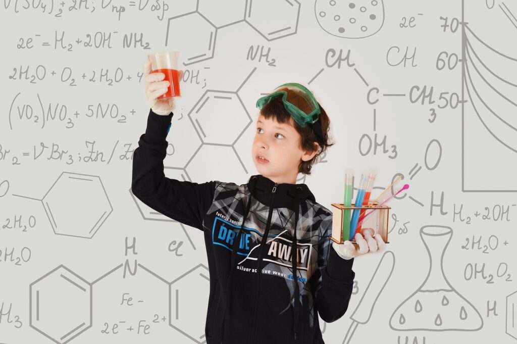 Hormones and Happiness The Neurochemistry of Happiness - boy in chemistry lab