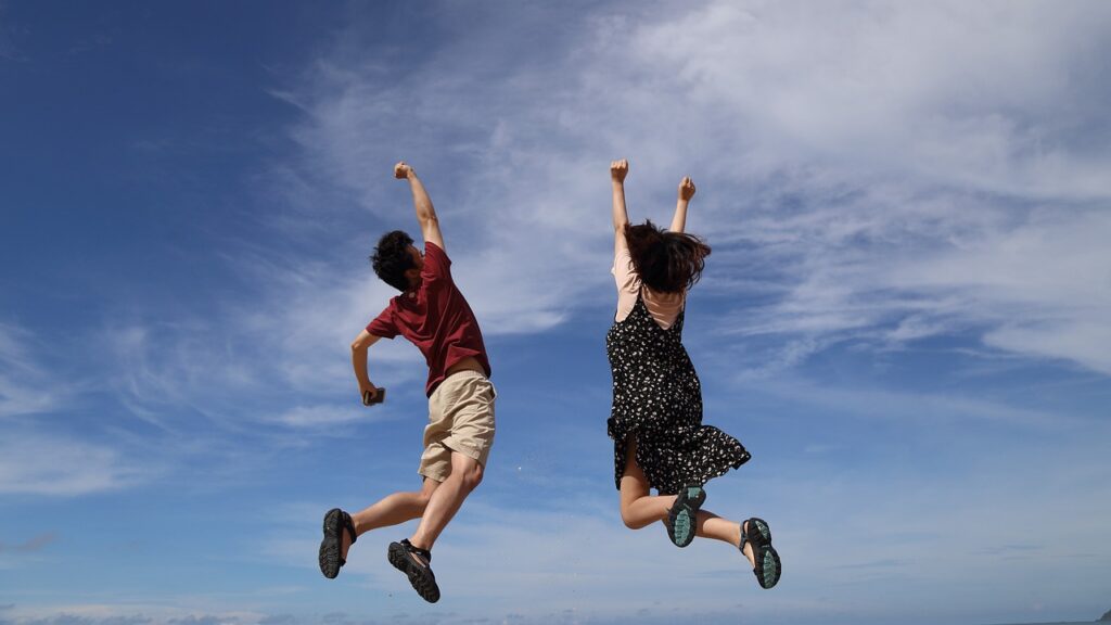 Hormones and Happiness: The Neurochemistry of Happiness - People jumping outdoors